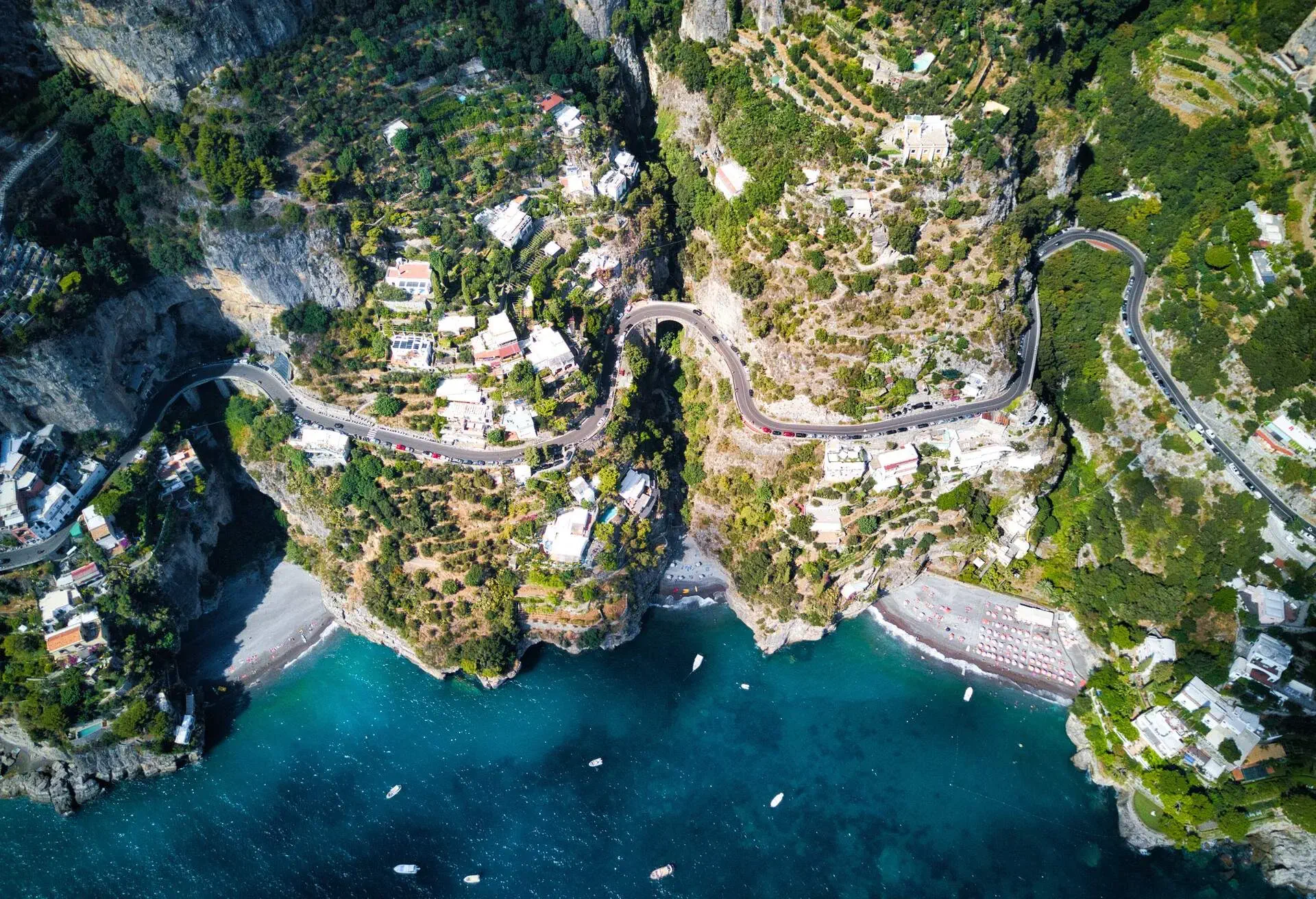 DEST_ITALY_AMALFI_COAST_POSITANO_THEME_ROAD_BEACH_GettyImages-1311496283