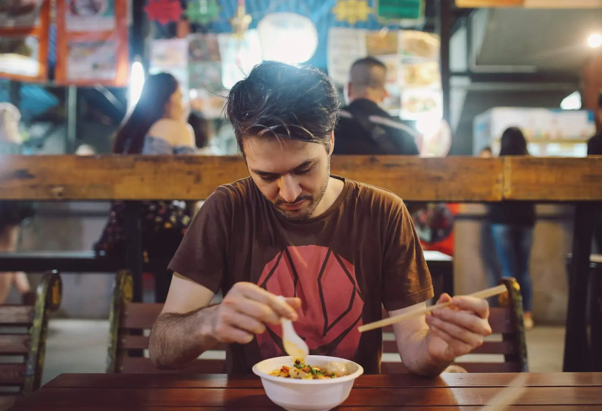 THEME_PEOPLE_MAN_STREET_FOOD_MARKET_GettyImages-943129452