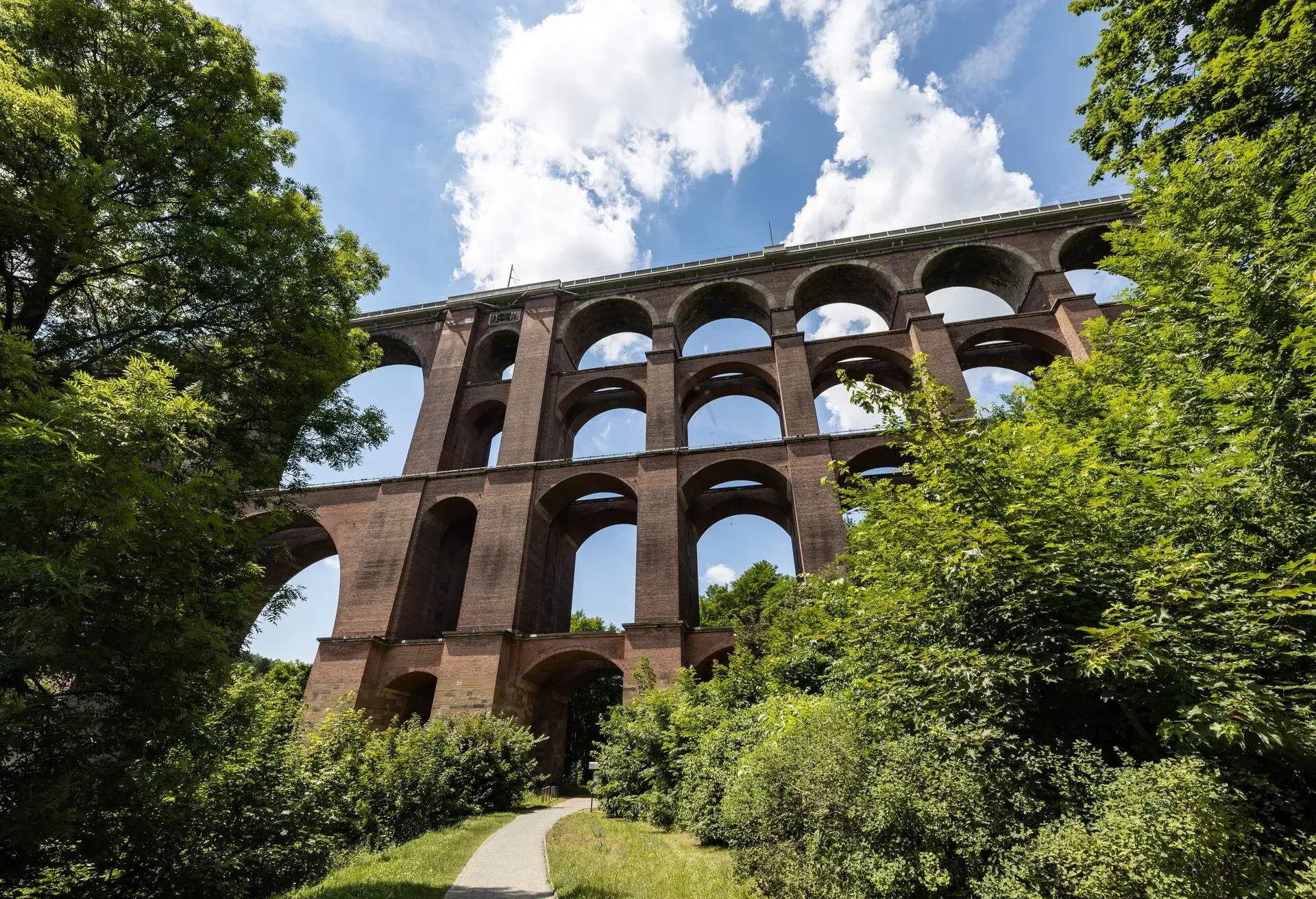 The Göltzsch Viaduct (German: Göltzschtalbrücke) is a railway bridge in Saxony/ Germany, built between 1846 and 1851. It is the largest brick-built bridge in the world (2.5 Million bricks). It spans the valley of the Göltzsch River between Mylau and Netzschkau, around 4 kilometres (2.5 mi) west of Reichenbach im Vogtland in the German Free State of Saxony...The bridge is infamous as a suicide bridge, because many people have taken their lives by plunging off the bridge in the last 150 years.