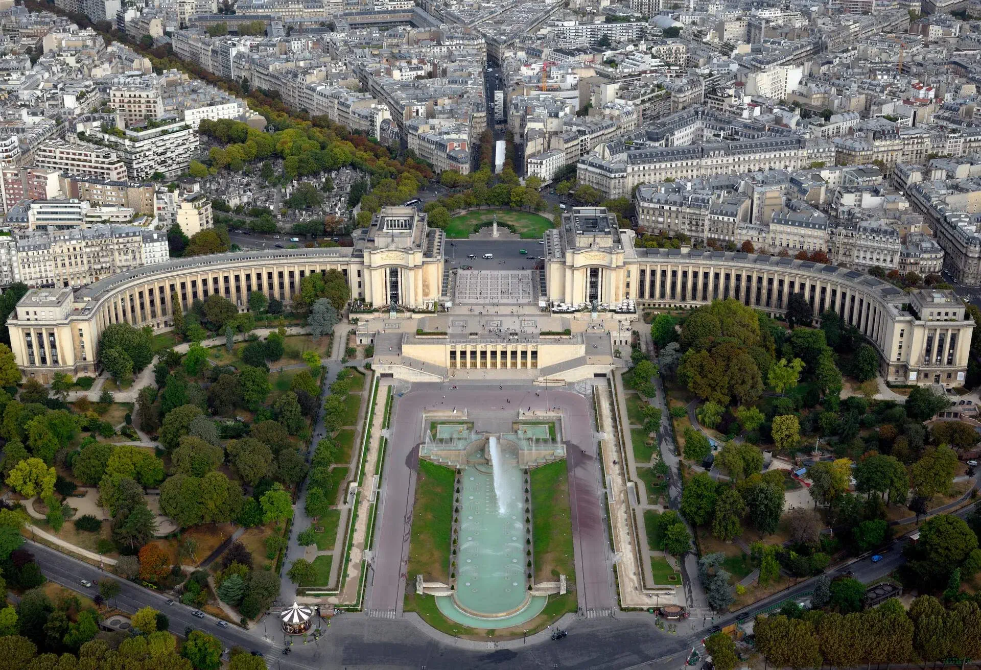 Photograph taken at an altitude of Three hundred and fourteen metres on a summer morning in August, having travellede on the East wing lift up to the highest viewing platform on La Tour Eiffel located at Champ de Mars, 5 Avenue Anatole France, 75007 in Paris, France. Here we look over part of Paris including the fountains in Jardins du Trocadero towards Place du Trocadero and Esplanade du Trocadero in Paris, France...The Eiffel Tower was originally designed by Gustave Eiffel and constructed between 1887-1889 as the entrance to the worlds fair in that year. It is now the worlds most visited paid monument, standing 324 metres tall (1,063ft) with three floors and eight lifts and was the tallest building in the world from 1889 to 1930.