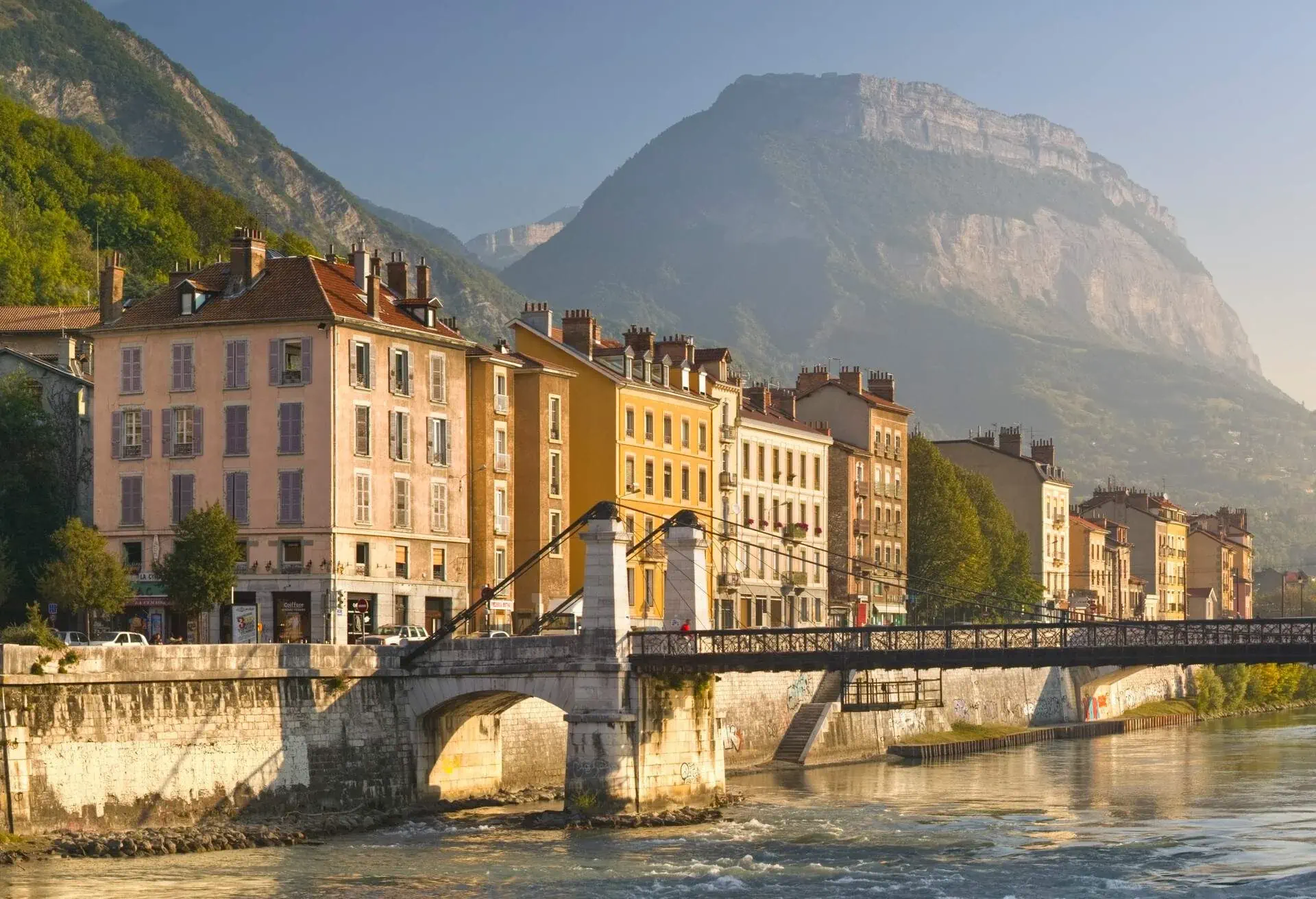 View along the River Isere with Pont St.-Laurent in the foreground.