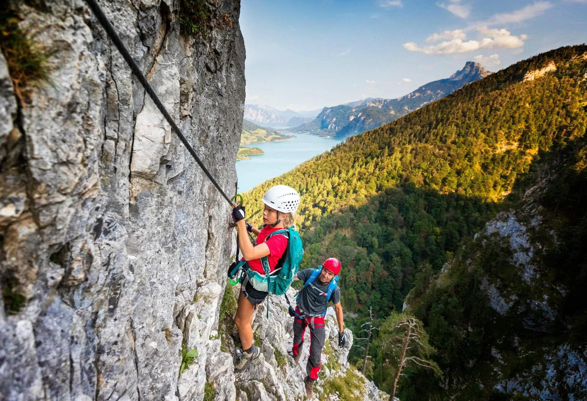 DEST_AUSTRIA_MONDSEE_VIA-FERRATA_THEME_ROCK-CLIMING_FAMILY_FATHER-CHILD_GettyImages-1029311800