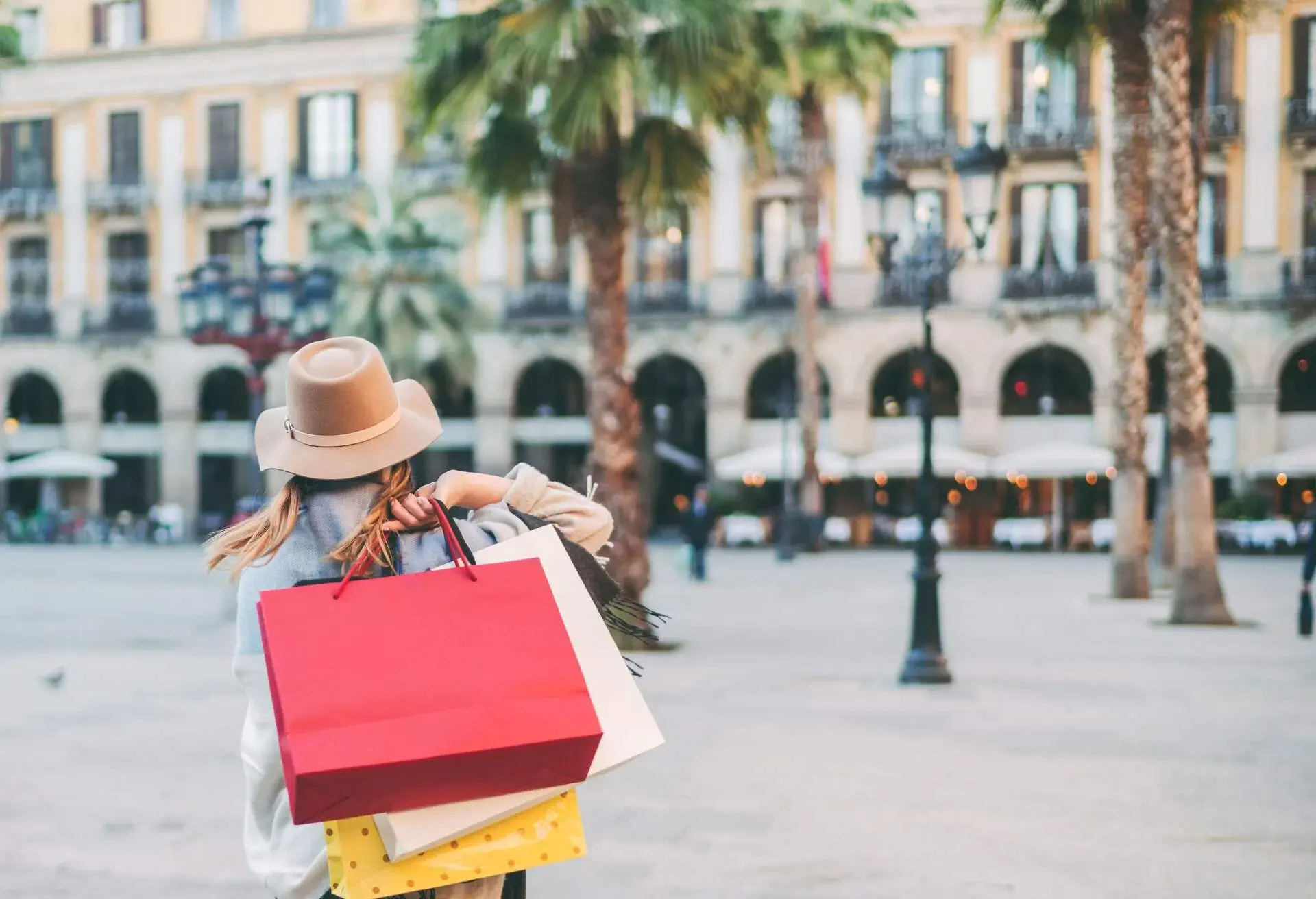 Rear view of woman shopping in Barcelona