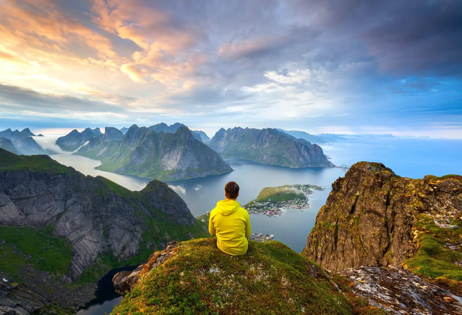 A man is watching to Sunset, Lofoten, Norway